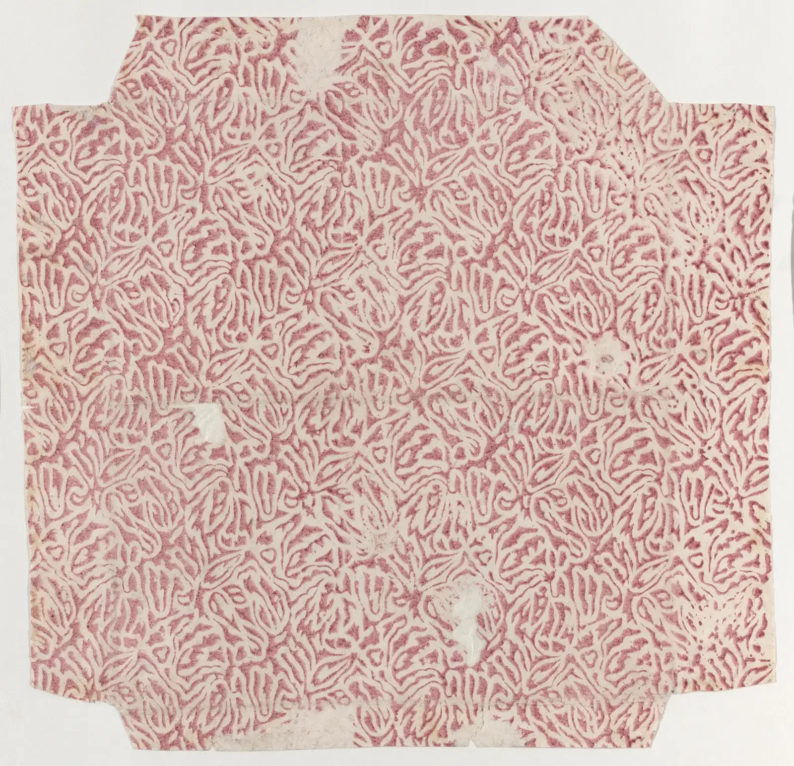 Sheet of paper printed all over with a dense red marbled pattern