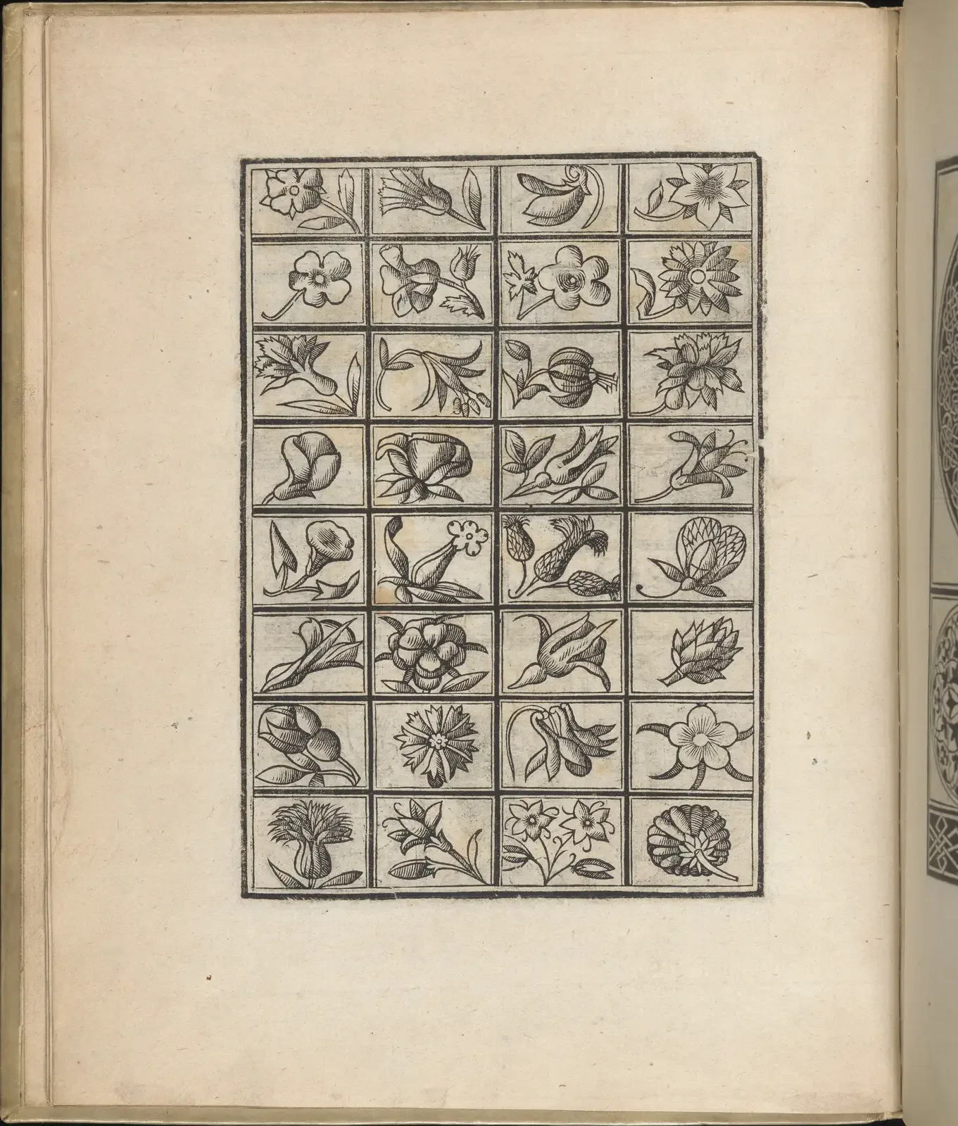 Page of a sixteenth-century pattern book: a grid of small woodcut flower and leaf ornaments