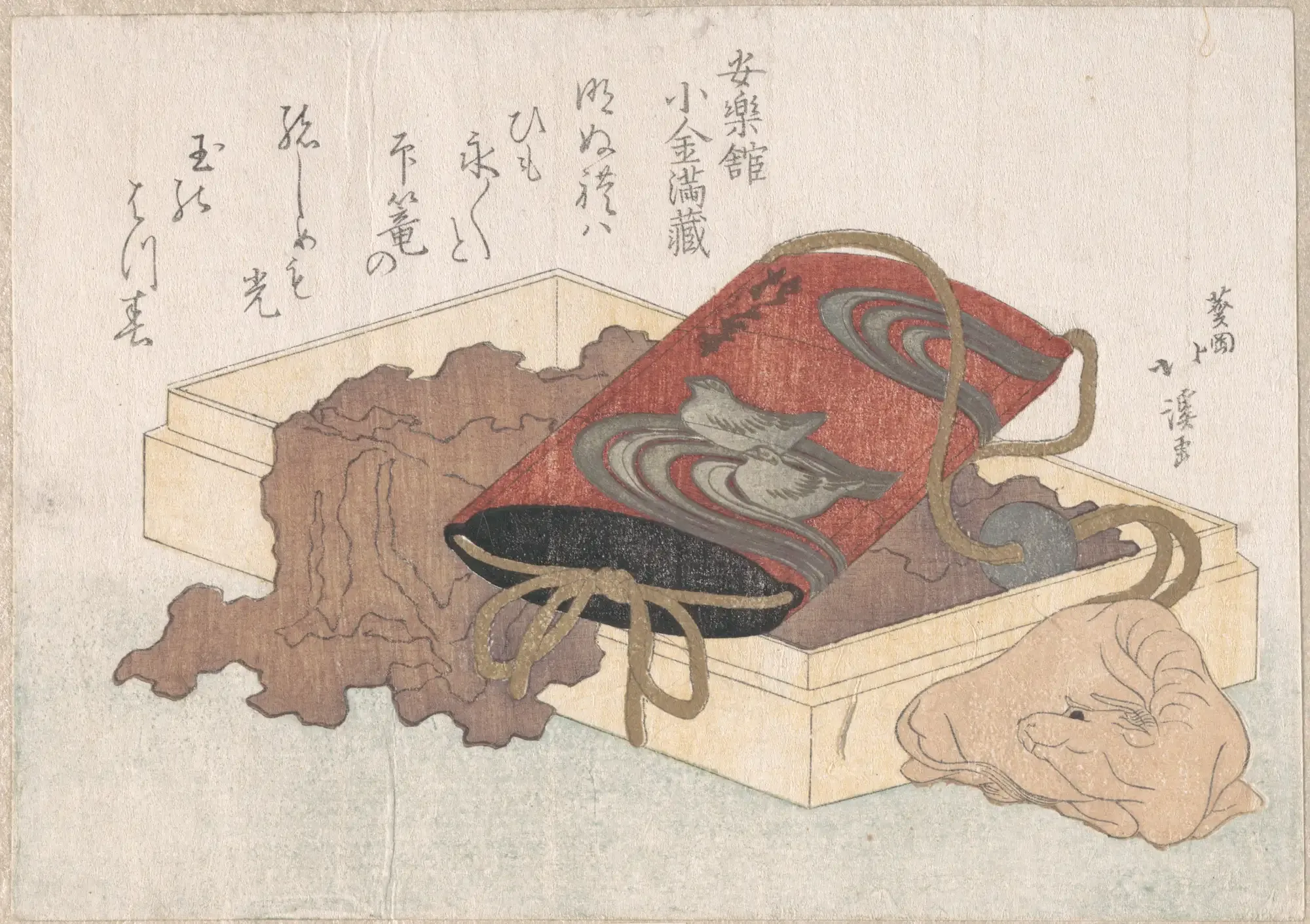 Japanese woodblock print of a red tobacco pouch and a carved netsuke resting in an open box