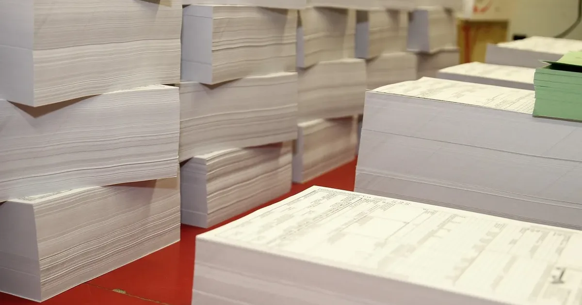 Stacks of cut paper on a print-shop floor